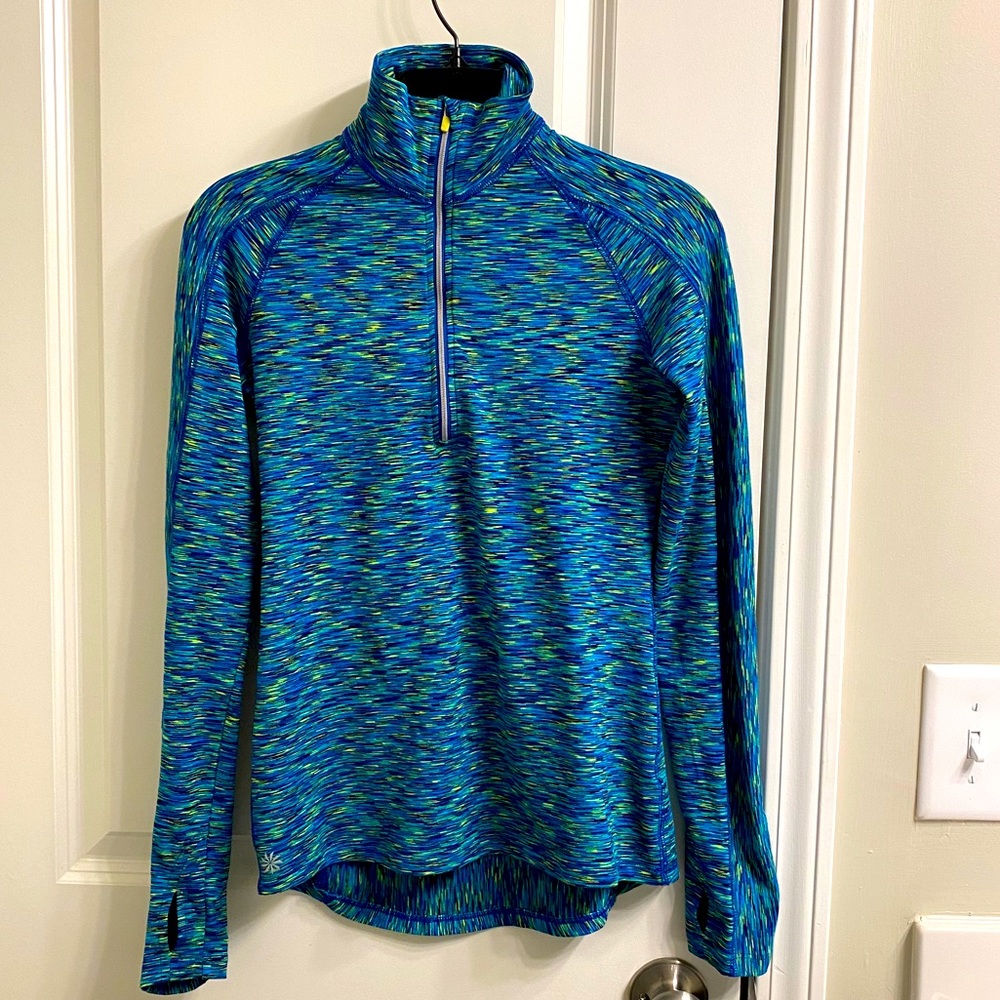 Athleta long sleeve teal 1/2 zip printed top.